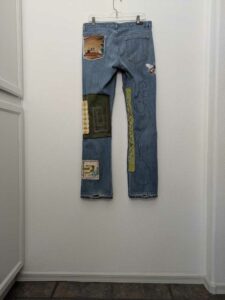 image of upcycled, thrifted jeans, worked with deadstock and reclaimed fabrics and embellishments