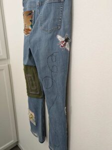 image of upcycled, thrifted jeans, worked with deadstock and reclaimed fabrics and embellishments