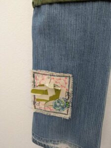 image of upcycled, thrifted jeans, worked with deadstock and reclaimed fabrics and embellishments