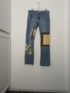 image of upcycled, thrifted jeans, worked with deadstock and reclaimed fabrics and embellishments
