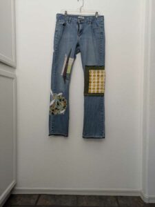 image of upcycled, thrifted jeans, worked with deadstock and reclaimed fabrics and embellishments